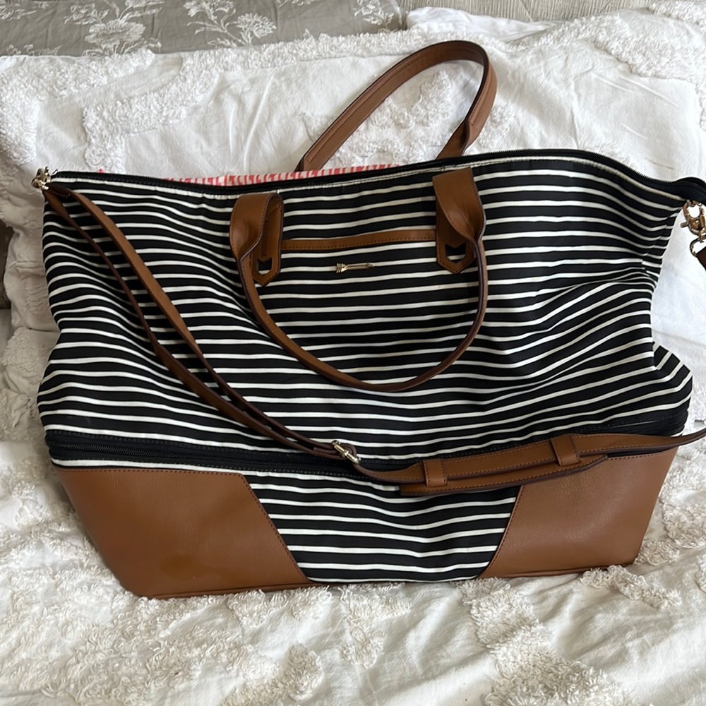 Used Stella and dot expandable tote.